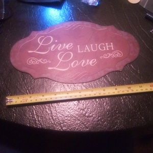 Metal "Live Laugh Love" wall hanging